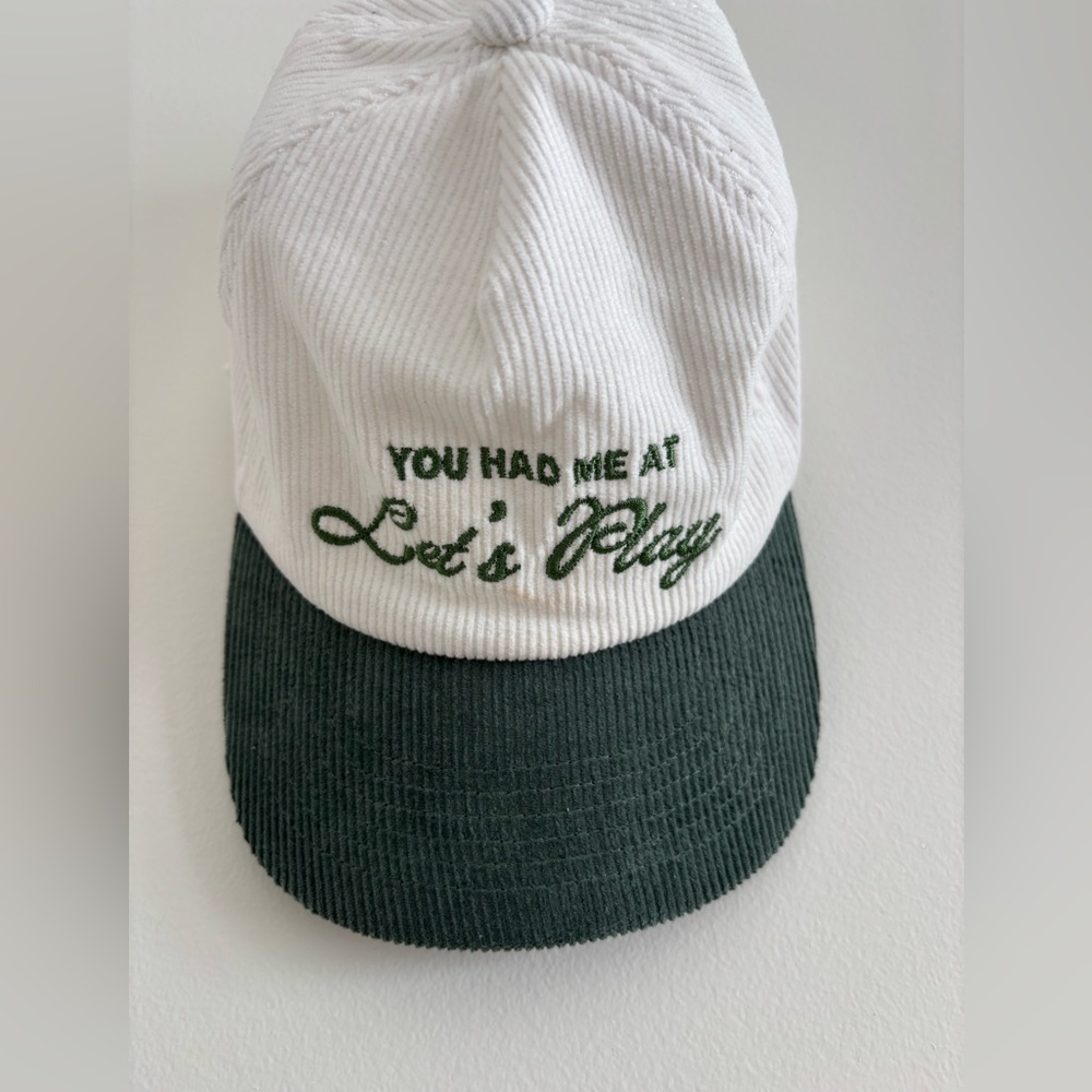 White Corduroy Baseball Cap with Dark Green Embroidered Text